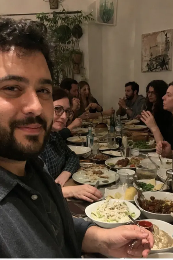 Cem at a huge family-style meal