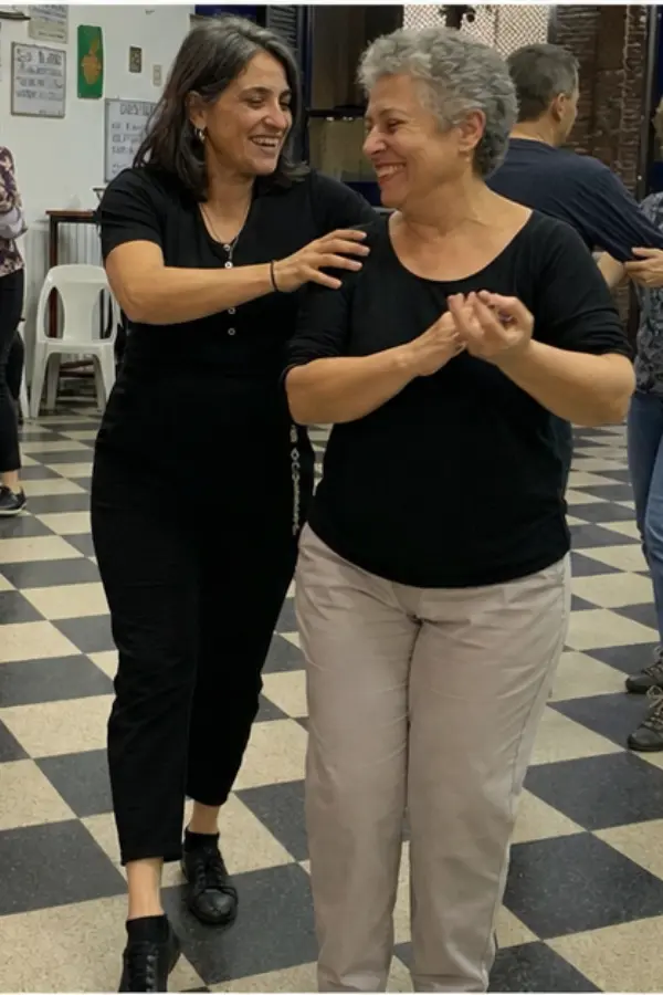 Inés dancing with friends