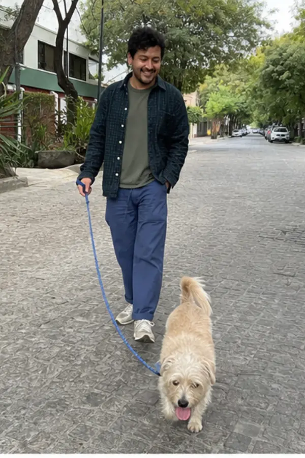 Mateo walking his rescue dog