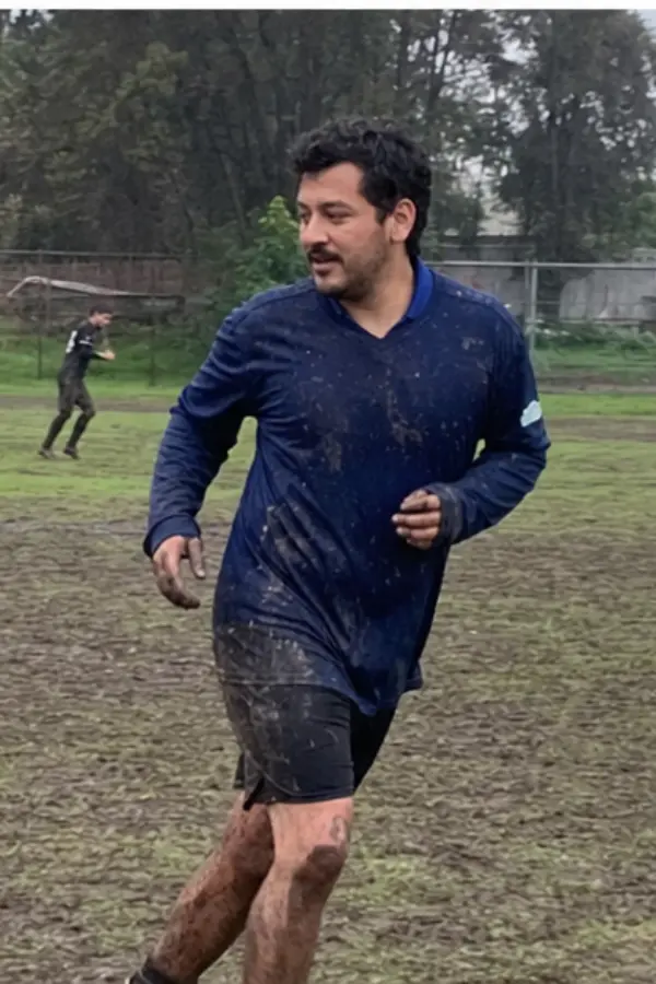 Mateo playing pickup football
