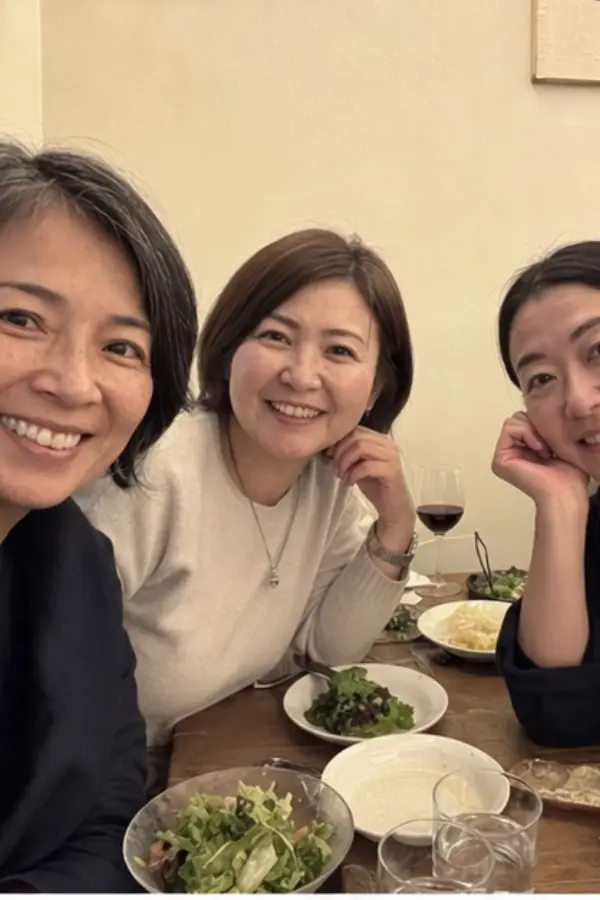 Naomi at dinner with coffee-shop friends