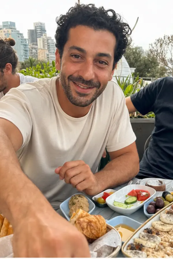 Omar at a long breakfast with friends